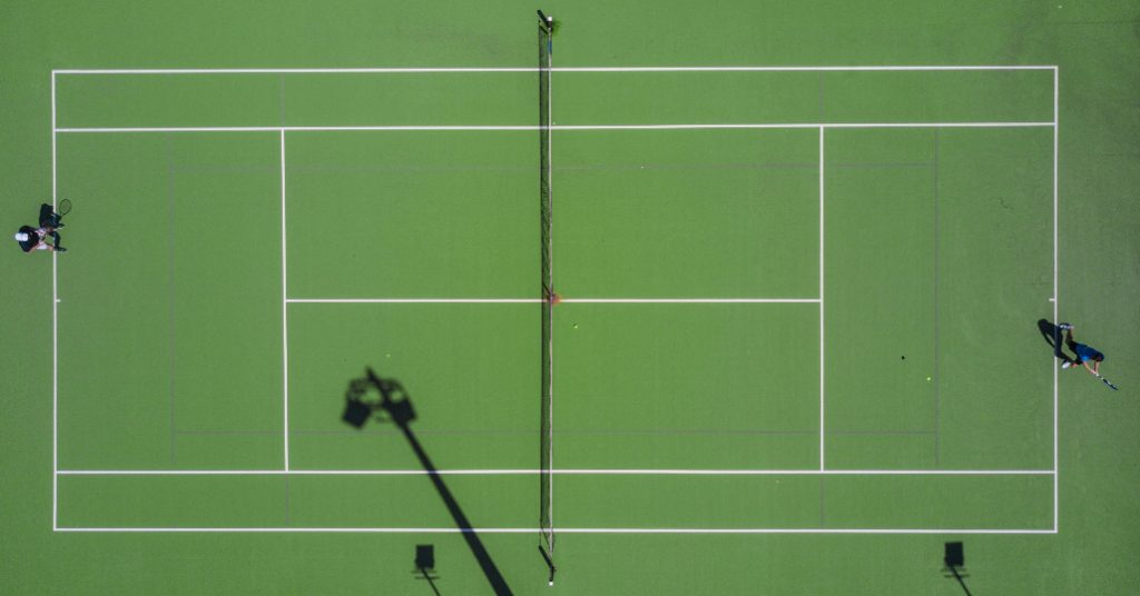 Overhead view of a tennis court, meant to represent Wimbledon