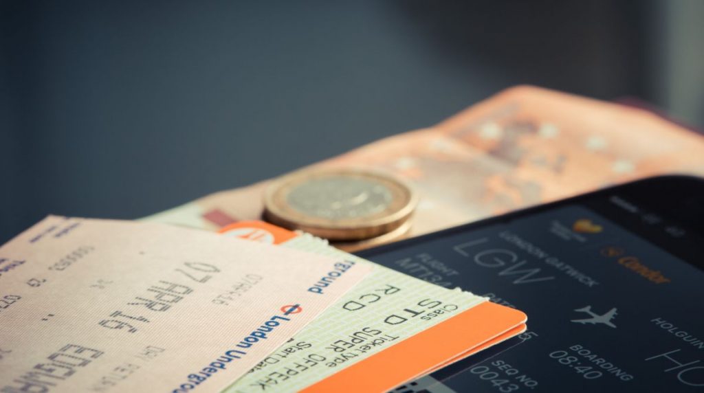 Generic photo of tickets and coin